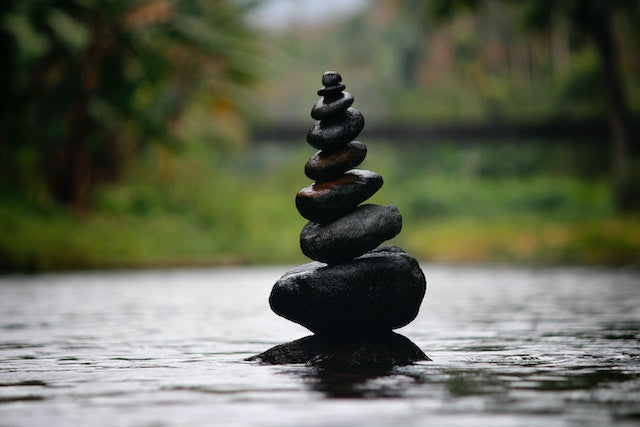 smooth rock pebbles of different sizes harmoniously stacked on top of each other