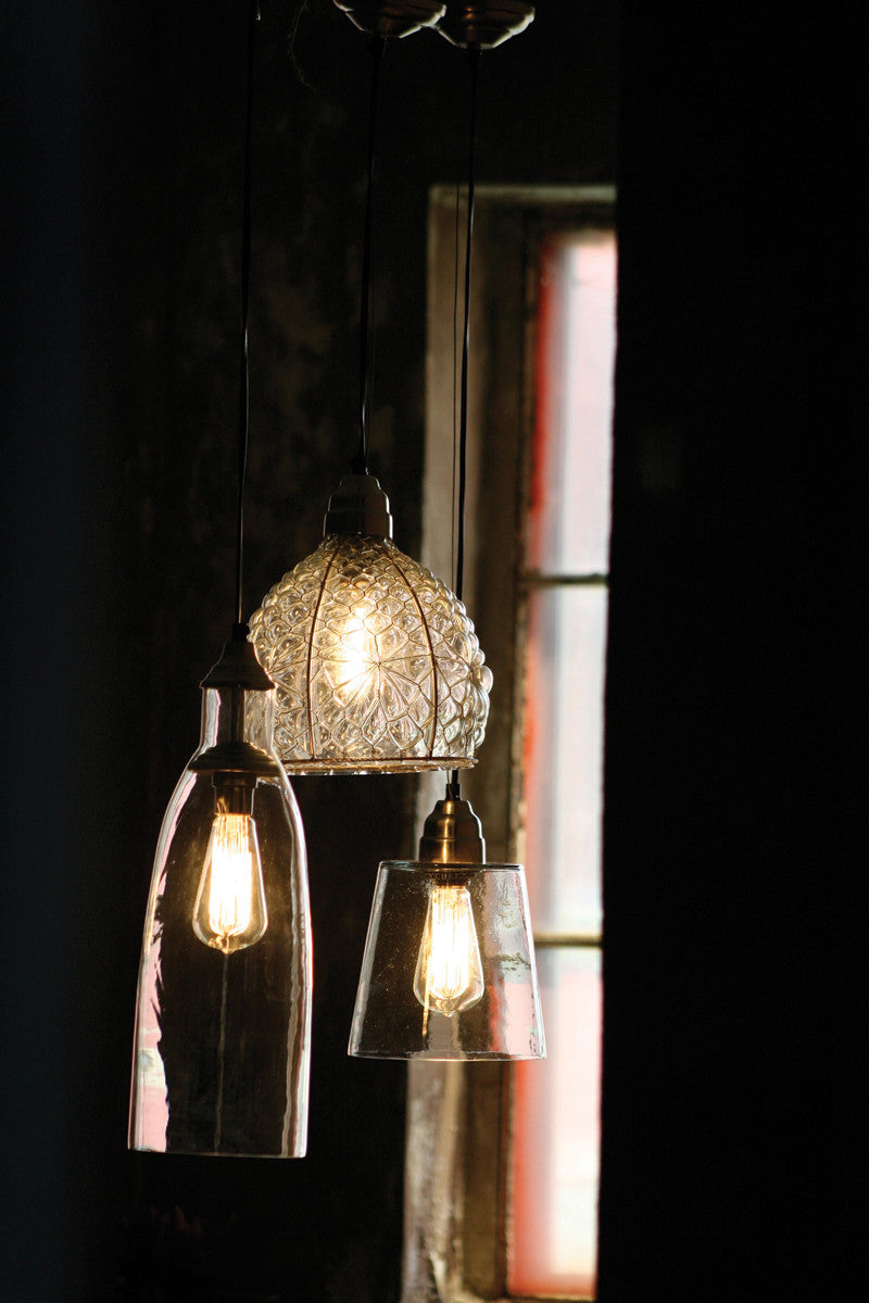 set of three hanging glass pendant lights