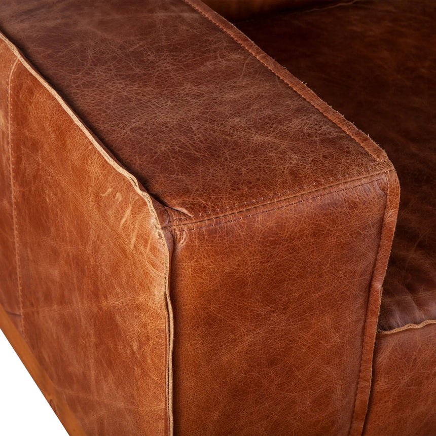 cognac color leather armchair - armrest close-up