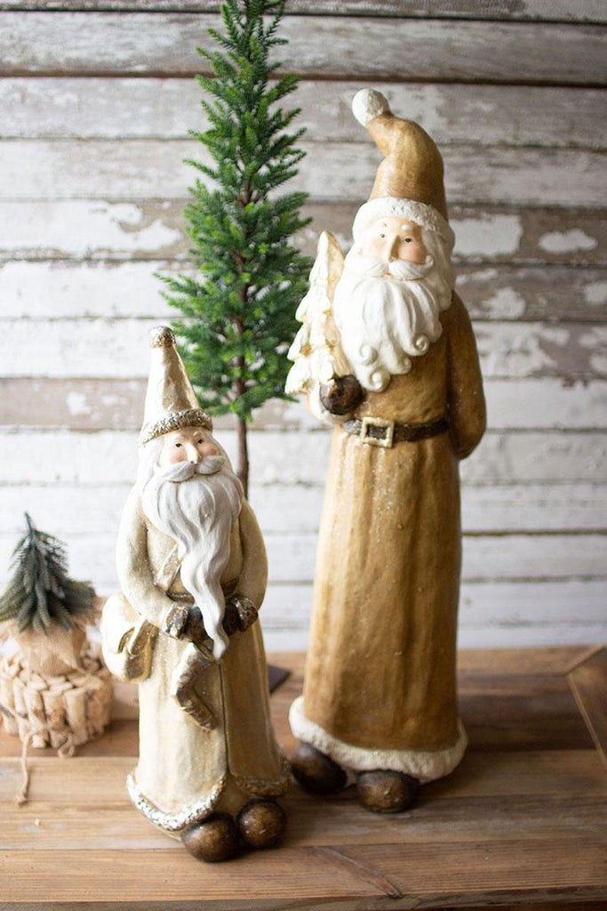 set of 2 santas, one small one large, one with light tan robe the other with light brown robe and santa hat
