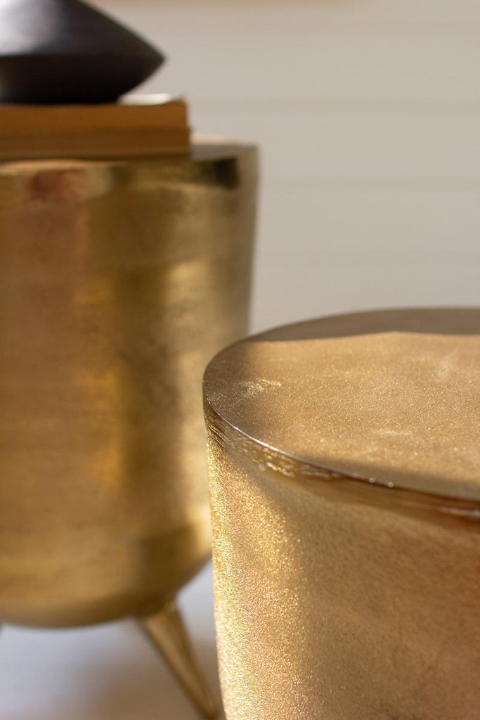pair of antique brass aluminum drum tables - close-up