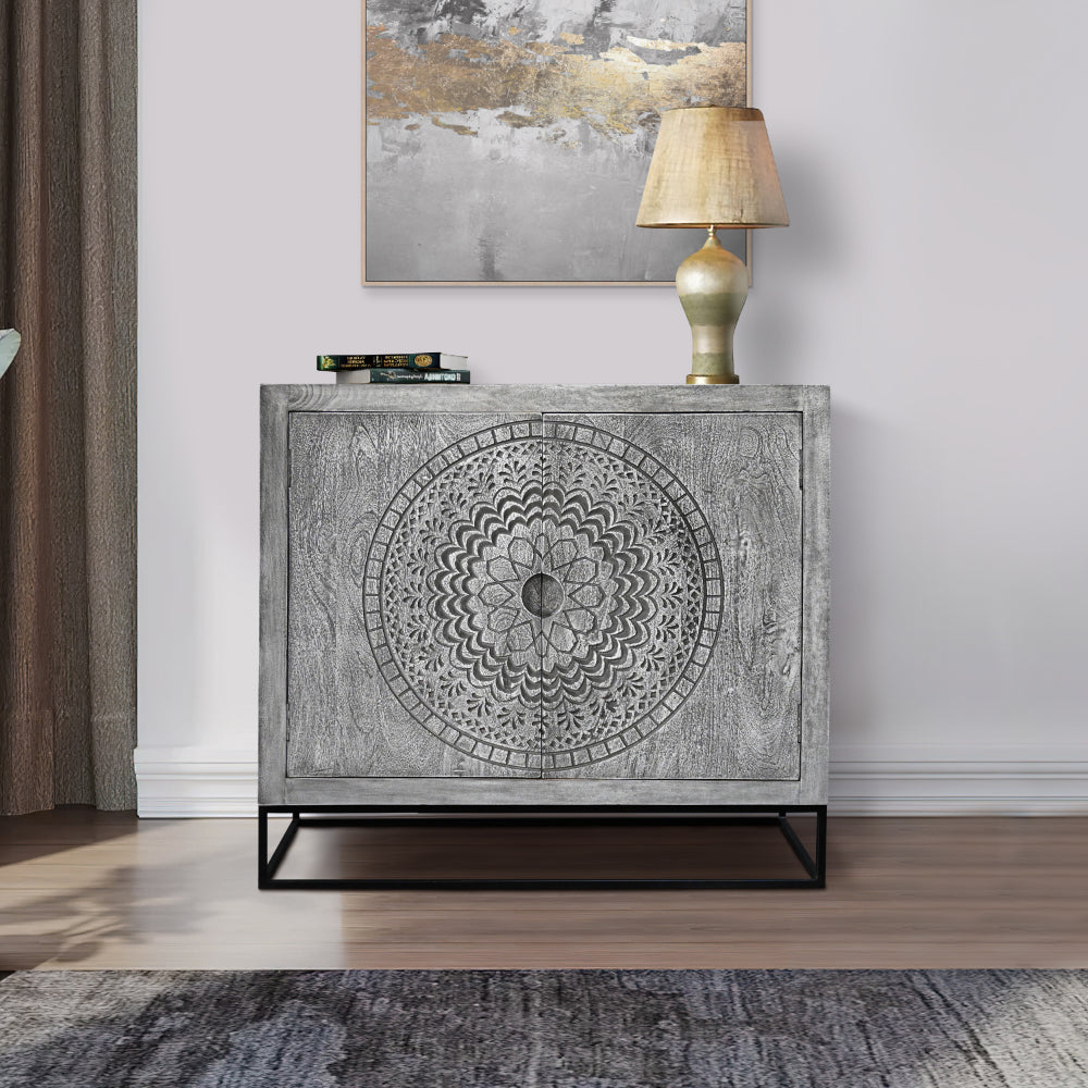gray mango wood accent cabinet with medallion engraved doors in living room setting