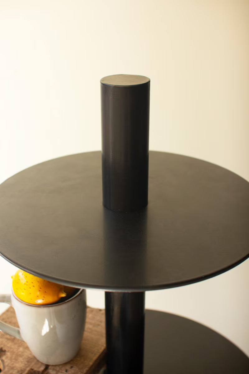 Close-up of top shelf of round, retail display with 5 shelf layers