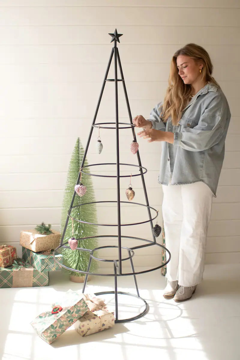 large metal frame shaped like christmas tree - zoomed in a little