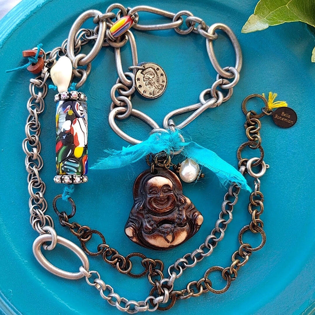 handmade mixed-metal necklace with hand carved happy buddha
