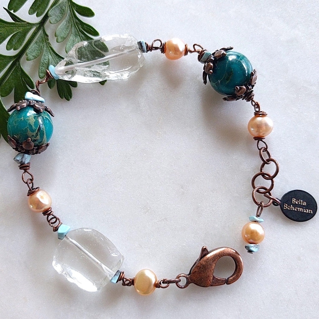 bracelet with creme color fresh water pearls, irregular glass beads, dyed serpentine jasper aqua round beads