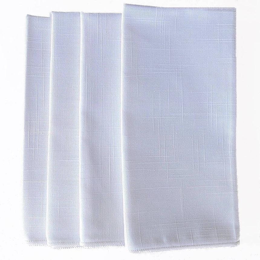 set of four square elegant white cotton napkins