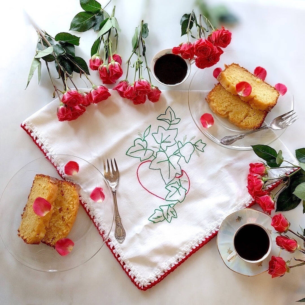 vintage cotton fabric tea towel with red tomato and green ivy motif - photo with food and flowers