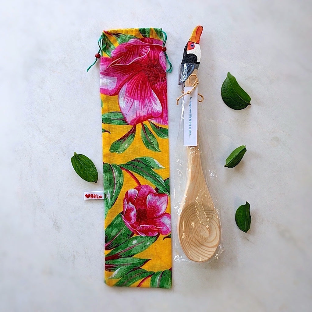 brazilian wood spoon with toucan head here shown with tropics themed gift bag
