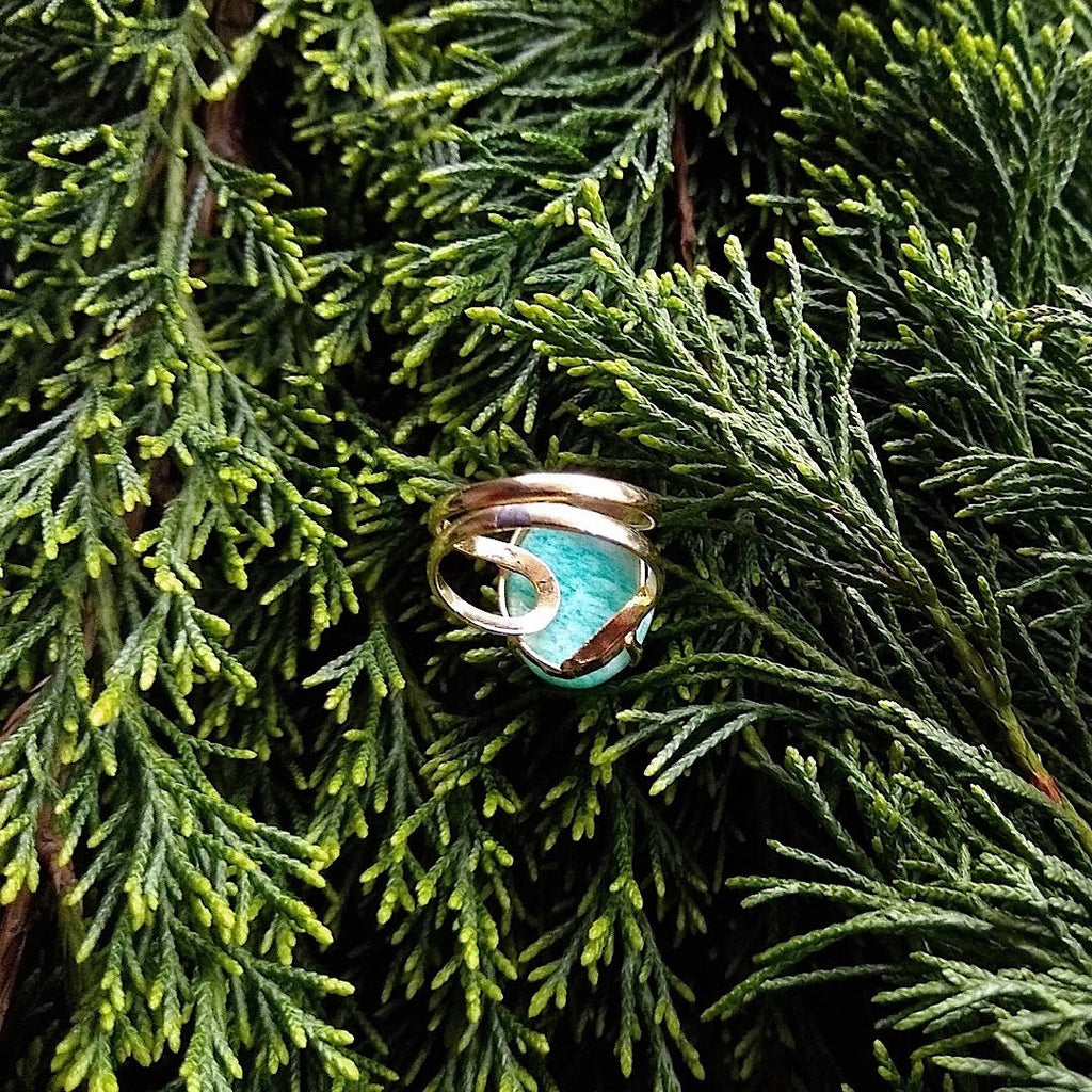 bottom view of oval shaped green amazonite cocktail ring