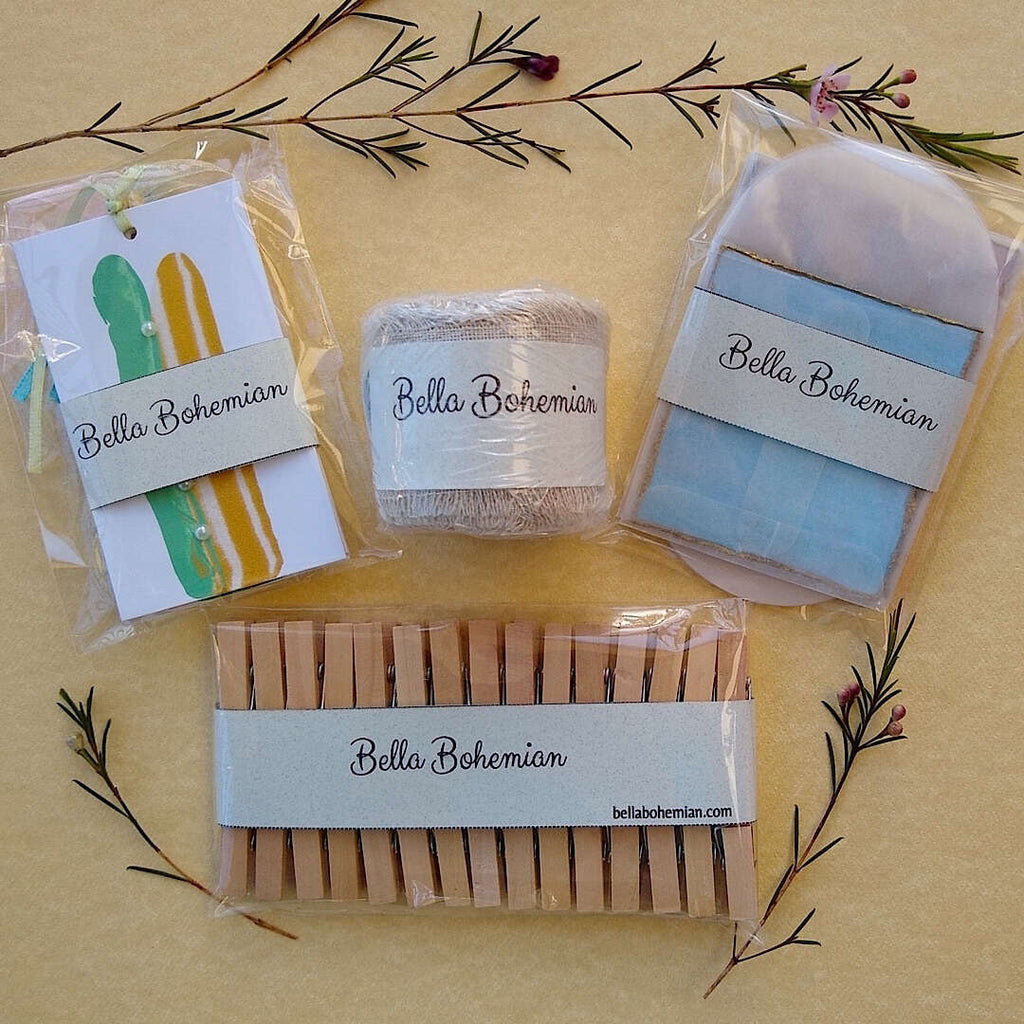 kit contents plastic wrapped: abstract gift cards, linen ribbon, wood clothespins, watercolor cards with glassine envelopes