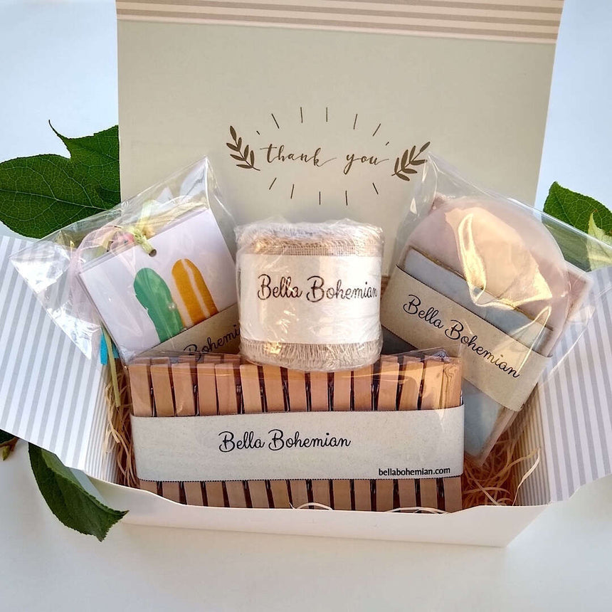 stationery kit with gift tags, linen ribbon, clothespins, glassine envelopes in a gift box, individually wrapped