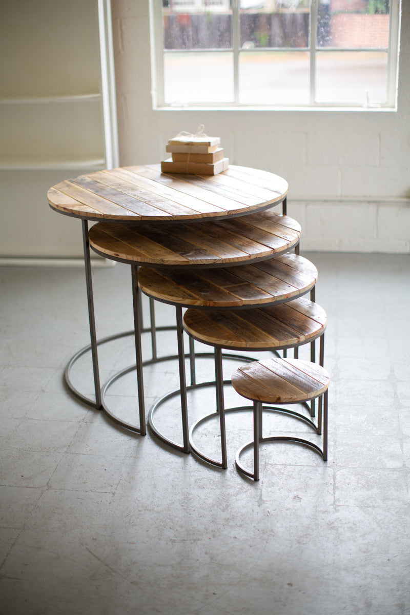 five round, iron and wood nested display tables