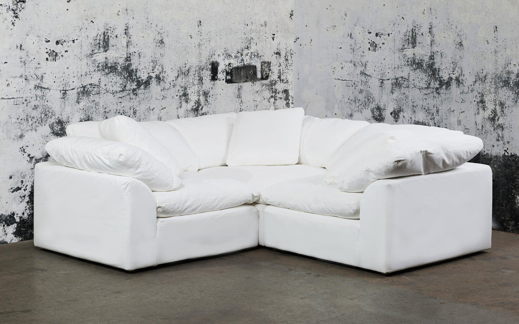 white 3-piece l-shaped slipcover sofa - with contrasting background