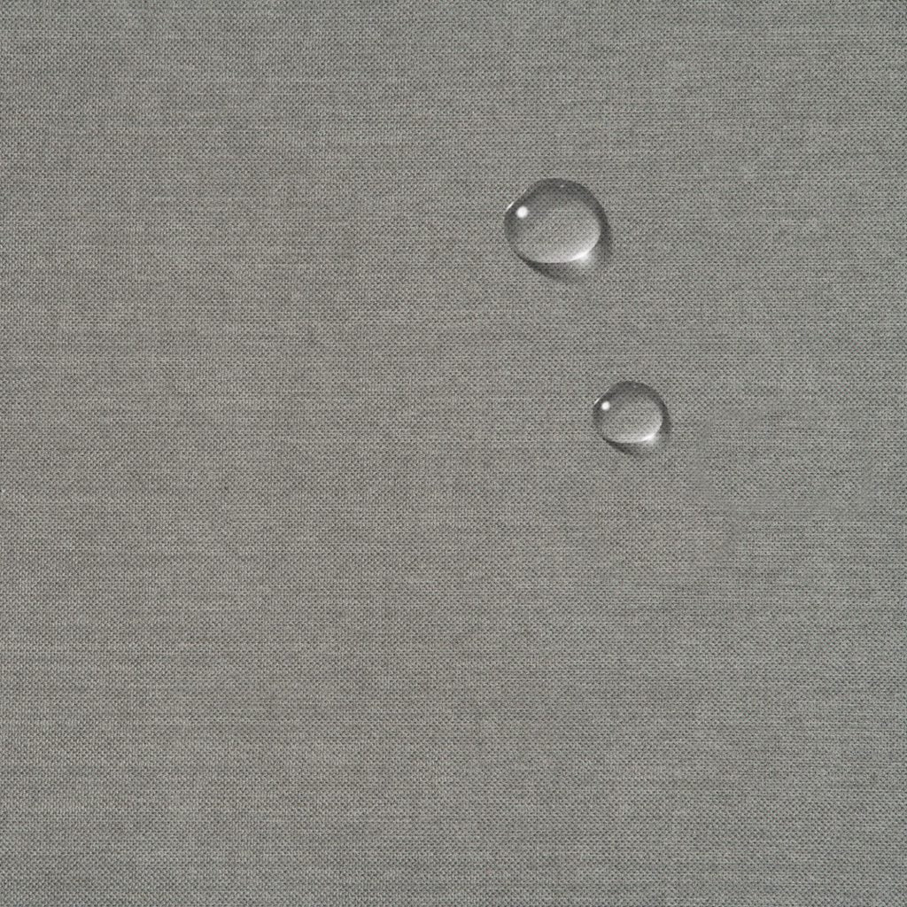 close-up of slipcover fabric - water resistance shown by pearls of water