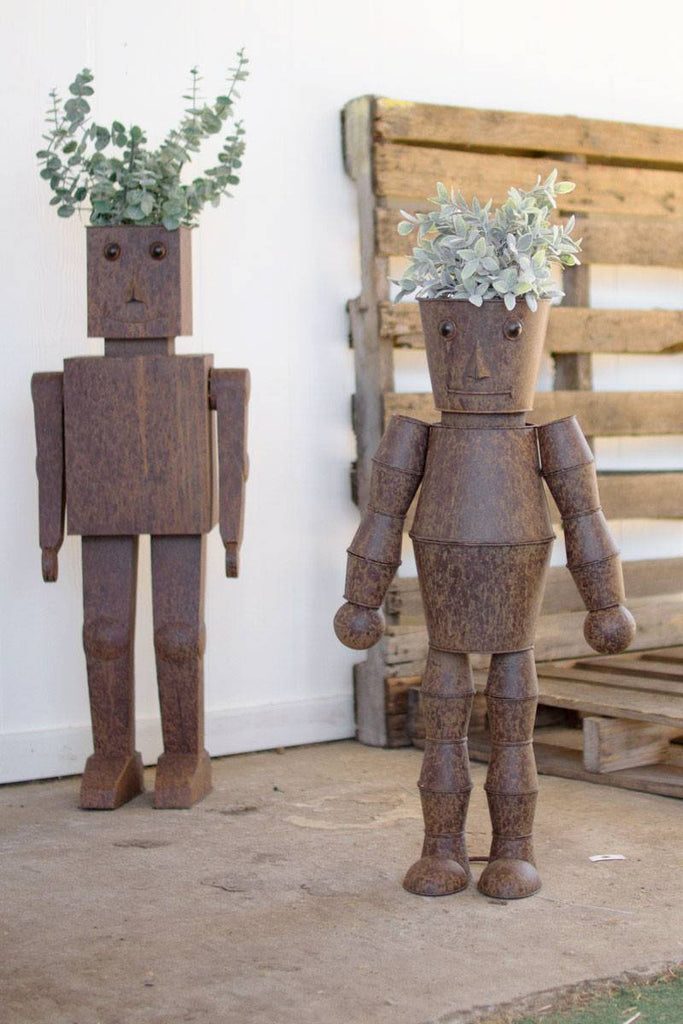 pair of robot shaped metal planters