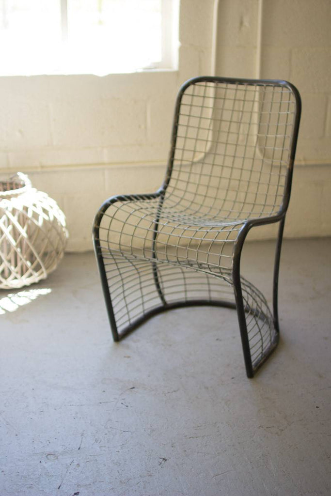 woven metal chair with natural curvatures