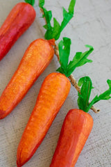 string of faux carrots - close-up