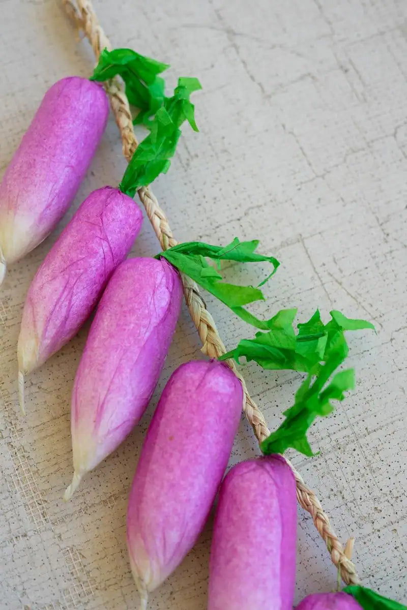 string of faux radishes - close-up