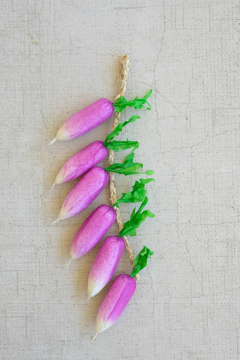 string of faux radishes - lined up