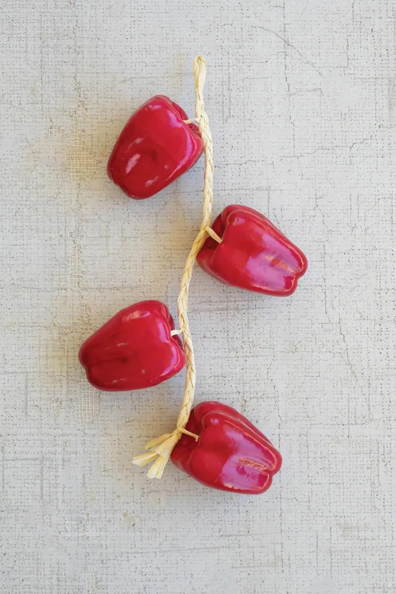 string of red faux bell peppers