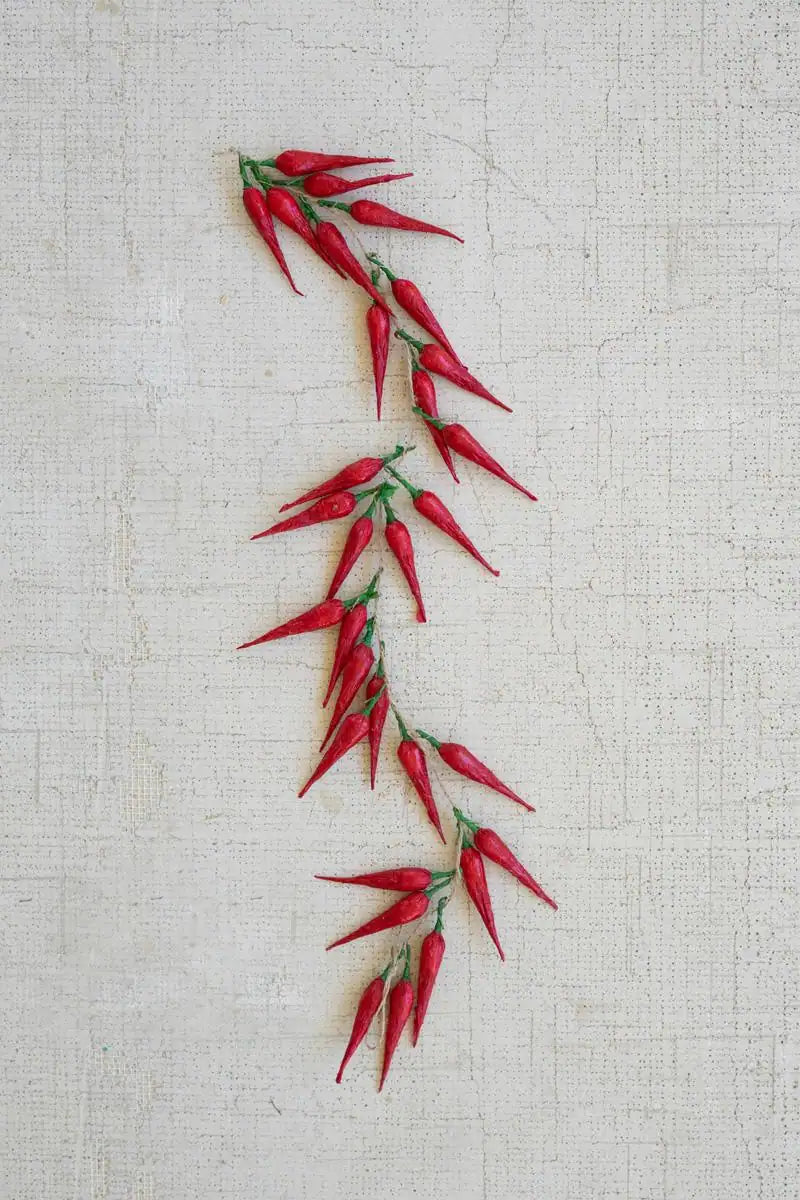 string of red faux peppers - S arrangement