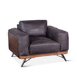 antique black leather armchair with plush upholstery - front angle view