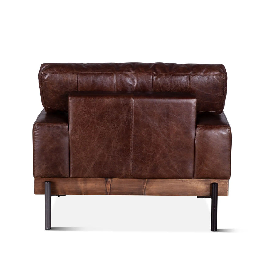 rustic brown leather armchair with wood frame and metal legs - rear view