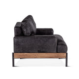 moroccan black leather armchair with wood frame and metal legs - right side