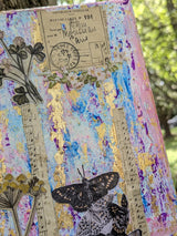 Top right close-up of mixed media canvas collage with floral, music and butterfly points of interest