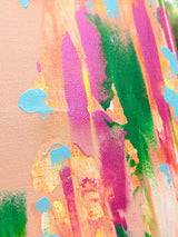 Abstract art with colorful brush strokes on a textured surface close-up