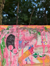 Collage art with pink and multicolor patterns on a textured surface - close-up of top canvas section