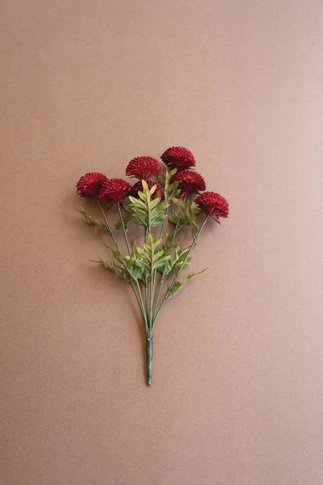 bundles of red faux zinnias