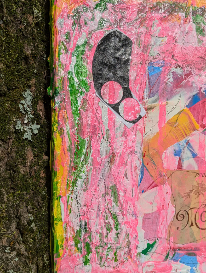 Colorful abstract art piece on a gray background - close-up of top left corner