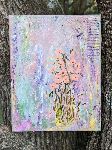 An abstract floral canvas painting featuring peach colored flowers with green stems, displayed against a textured tree trunk background.