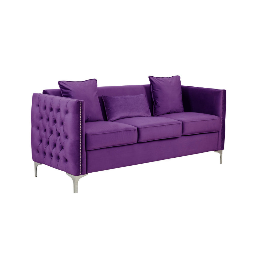 purple velvet sofa with three loose pillows