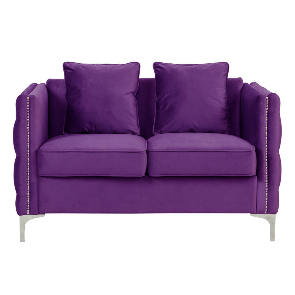 purple velvet loveseat with two loose pillows