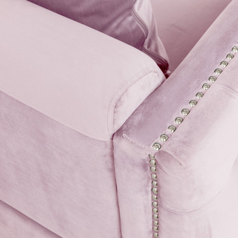 close-up of pink sofa's arm and backrest
