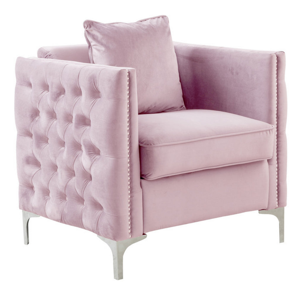 pink velvet sofa chair with loose pillow - front right view
