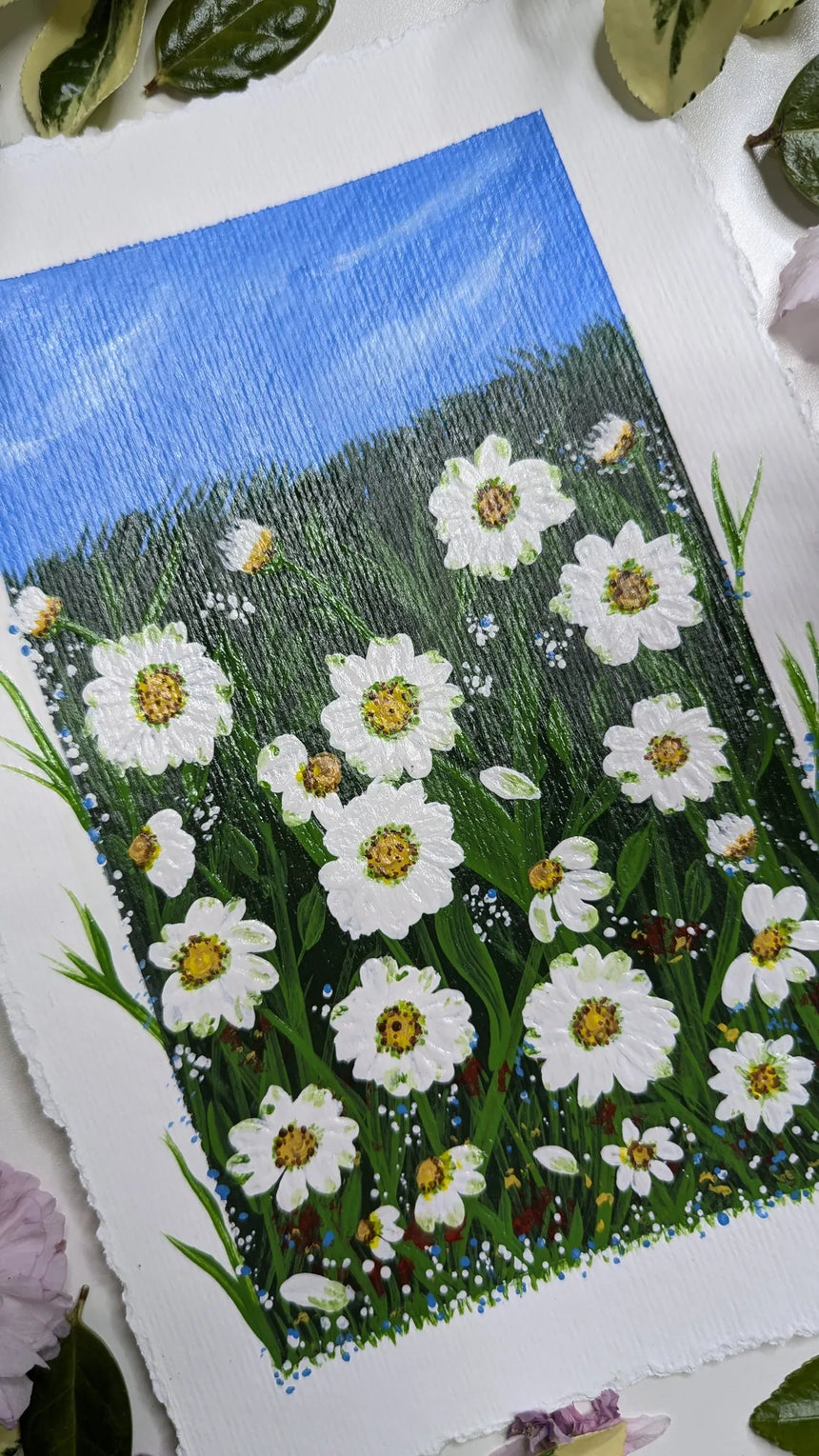 acrylic painting study of field of daisies beneath blue skies - slanted left view