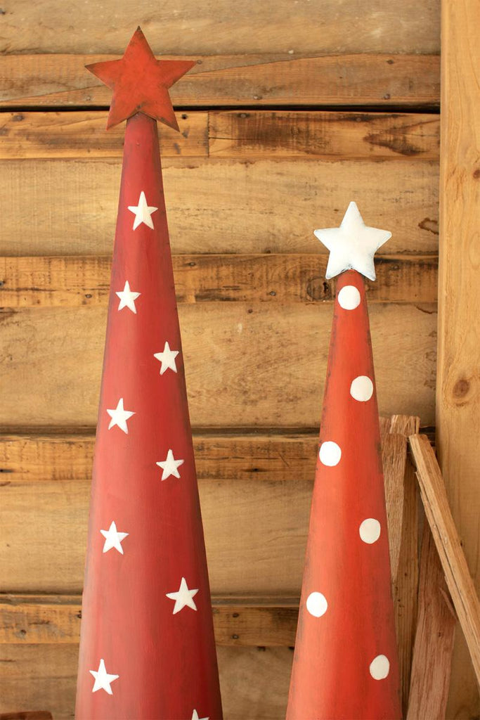 showing 2 red topiaries with a star at the top - close-up of white stars and white polka dots patterns