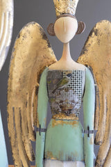 close-up of white skirt angel's face and top