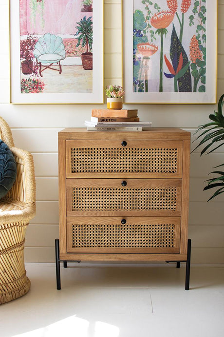 wood and woven cane nightstand on black metal legs with 3 drawers - front view