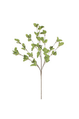 Artificial green leaf branch on a white background