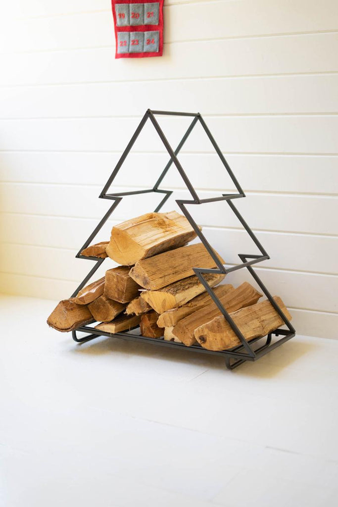 christmas tree shaped firewood rack made of metal - shown half-full with wood logs
