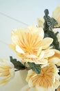 artificial plant with bright yellow blossoms made with latex rubber - close-up view