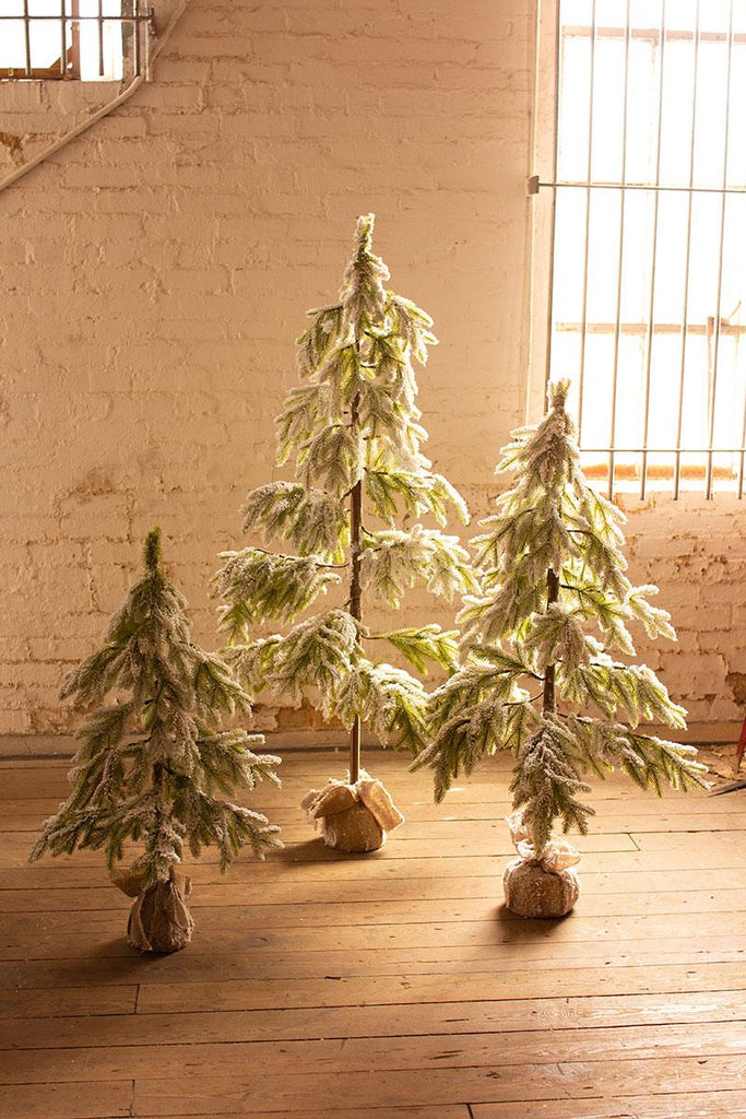tall artificial frosted christmas trees - showing what a group of 3 trees would look like in a space