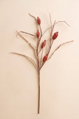 This tall faux botanical stem features slender branching lines accented with muted red berry-like details for an airy natural look.