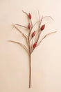 This tall faux botanical stem features slender branching lines accented with muted red berry-like details for an airy natural look.