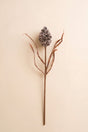This sculptural faux stem features a textured pinecone-inspired accent paired with delicate branching details for a naturally collected woodland look.